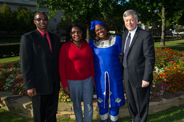 Pitt faculty hailing from Kenya joined Chancellor Mark A. Nordenberg at the dedication of the Wangari Maathai Trees and Garden. From left, Julius Kitutu, assistant dean for student services and assistant professor of acute and tertiary care in the School of Nursing; Macrina C. Lelei, associate director of the African Studies Program and adjunct assistant professor of administrative and policy studies in the School of Education; Leonora Kivuva, Swahili instructor in the Department of Linguistics; and Chancellor Nordenberg.   