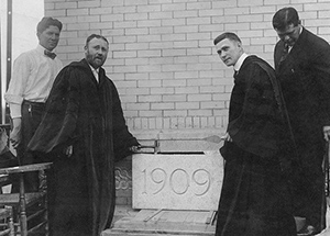 Chancellor Samuel McCormick (second from left) helps lay the cornerstone for Thaw Hall in 1909.  Inset: Time capsule box from 1910 in Pennsylvania Hall 
