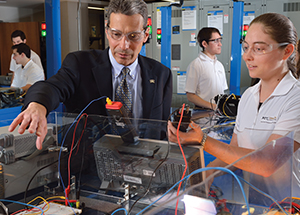 Gregory Reed, a Pitt professor of electrical and computer engineering, with students in Benedum Hall’s Electric Power Systems Lab. 