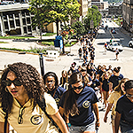 Applications for admission to the undergraduate programs in Pittsburgh have increased three-and-one-half times from 1995 to 2013. Above, new students walk to the Petersen Events Center for Pitt's Freshman Convocation in 2012.